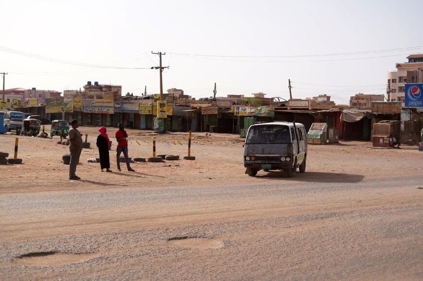Few Sudanese have dared to venture out as battles rage:  streets in Khartoum's twin city Omdourman were largely empty on Sunday
