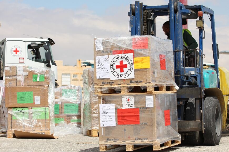 Boxes of humanitarian aid in Amman, Jordan are readied for a flight to Port Sudan