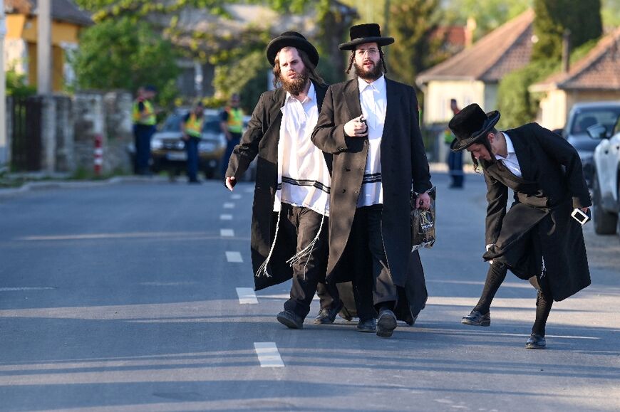Hasidic Jewish pilgrims flock to the rabbi's home as part of their pilgrimage