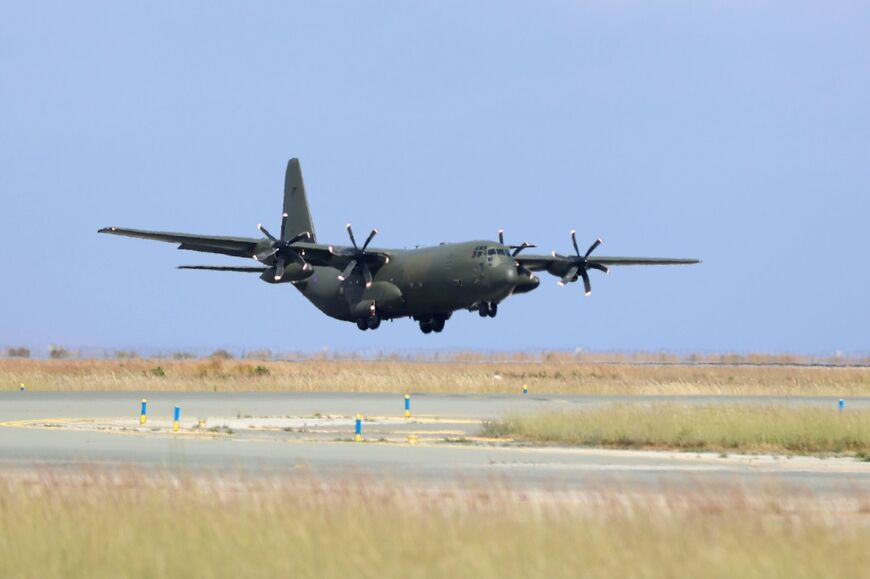 A British Royal Air Force C-130 Hercules military transport carrying evacuees from Sudan lands at Larnaca International Airport in Cyprus