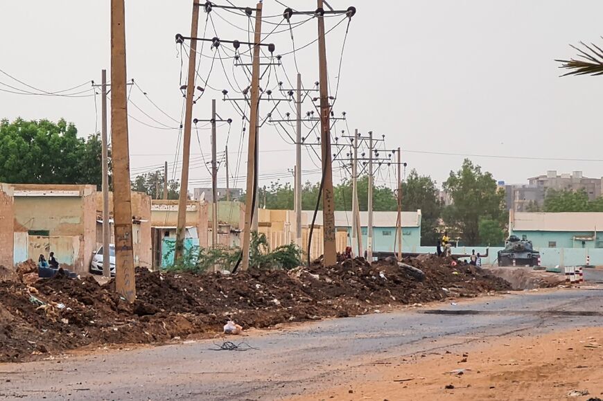 In parts of the capital, long mounds of dirt are piled beside roads where military trenches have been dug