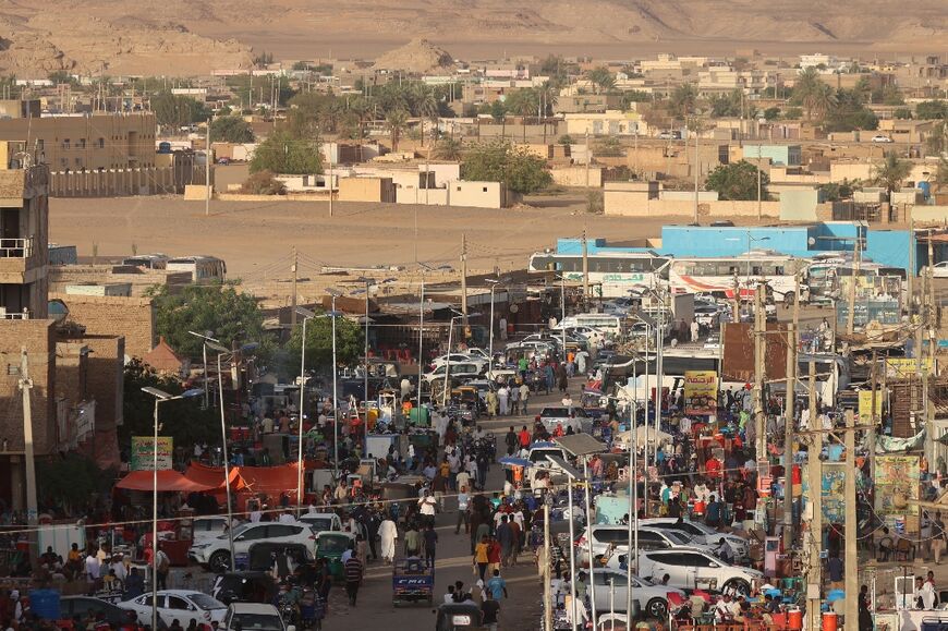 Large numbers of Sudanese fleeing the fighting gather in the town of Wadi Halfa bordering Egypt, in a picture from May 4, 2023