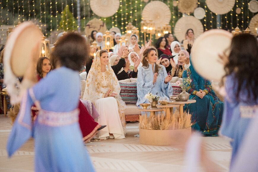 Rajwa Al Saif is seen sitting next to her future mother-in-law Queen Rania at a pre-wedding dinner party