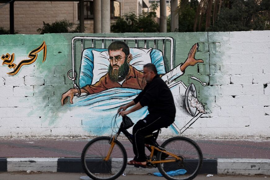 Today, Adnan's face can be seen stencilled or painted on walls across the West Bank and Gaza
