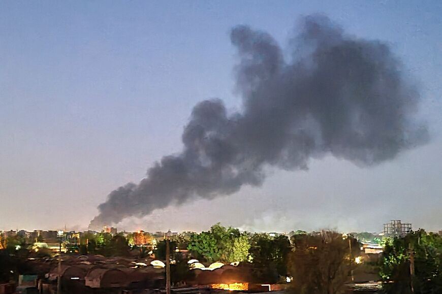 Smoke billows in Khartoum amid fighting between the forces of two rival generals in Sudan on May 6, 2023