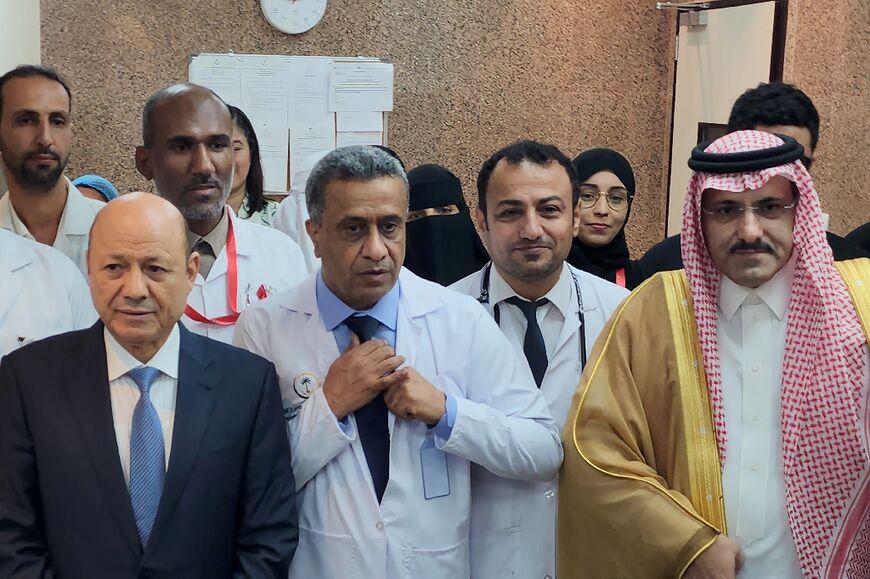 Saudi Arabia's ambassador to Yemen Mohammed al-Jaber (R) and Rashad al-Alimi (L), President of Yemen's new leadership council, attend the unveiling of a renovated hospital in Aden on May 10