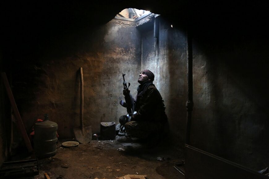 A file picture shows a Syrian rebel fighter in Arbeen on the outskirts of the capital Damascus on January 29, 2016
