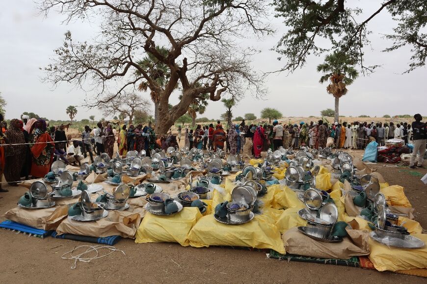 In Koufroun, Chad, aid kits await some of the tens of thousands of people who have crossed the border from Sudan
