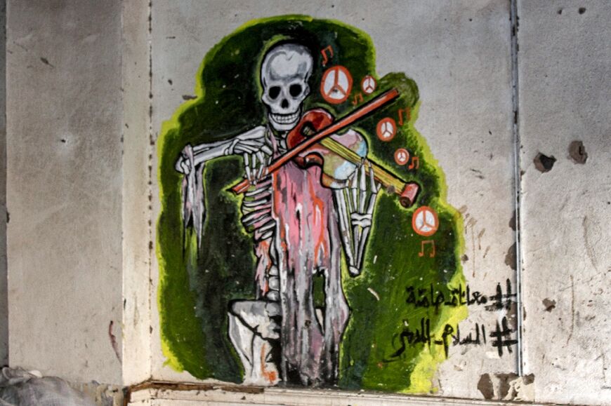 Aden resident Amr Abu Bakr Saeed says the mural are a dark but necessary tribute to the dead