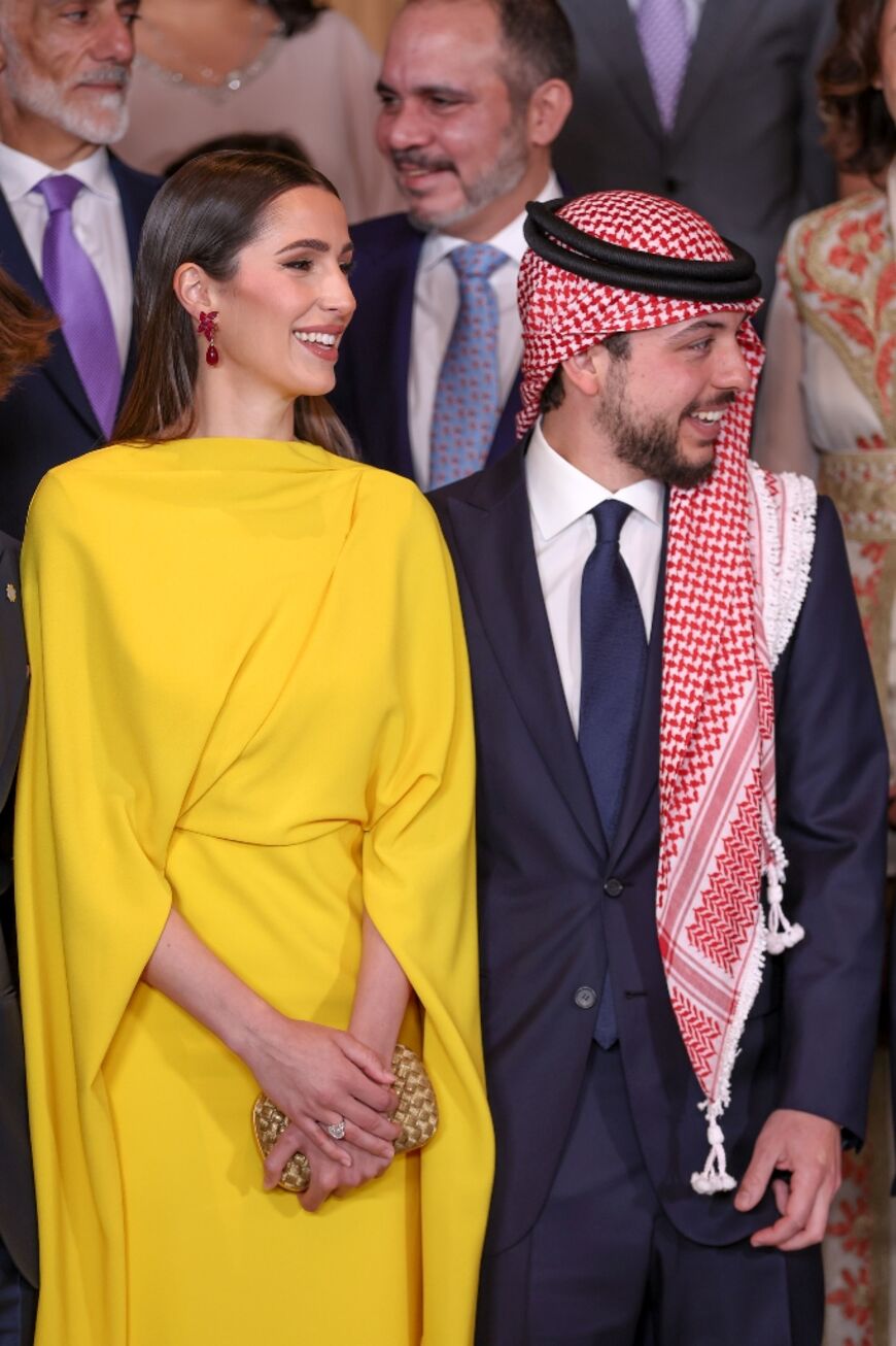 Crown Prince Hussein and Rajwa Al Saif at the wedding of his sister Princess Iman in Amman on March 12