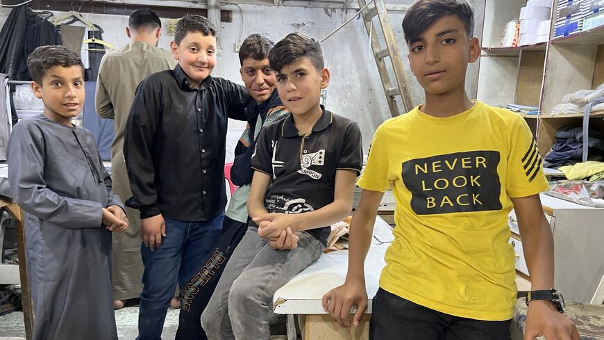These tailor’s apprentices in Raqqa say it’s “ok” for girls to play soccer. April 25, 2023. (Amberin Zaman/Al-Monitor)