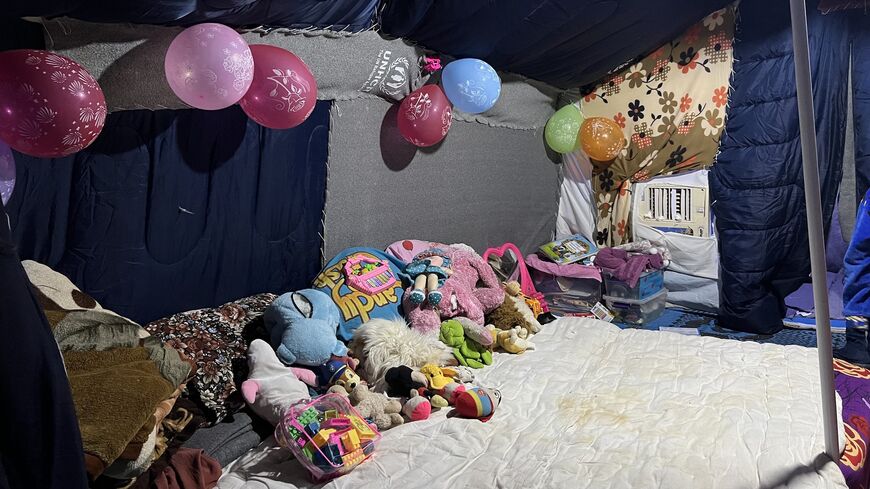 The inside of a tent at Roj Camp shared by an Egyptian detainee and her two children, April 29, 2023. (Amberin Zaman)
