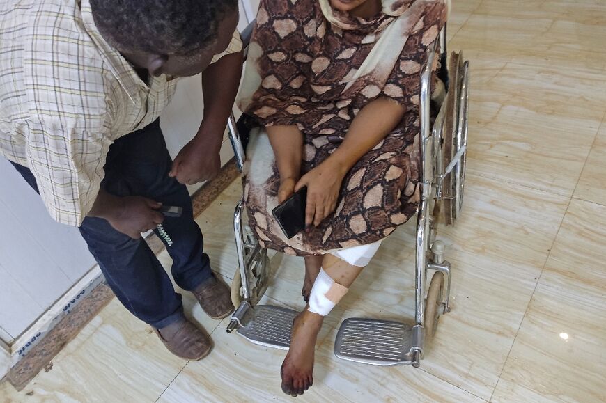 After a shell hit her house, a wounded woman received treatment at a hospital in southern Khartoum