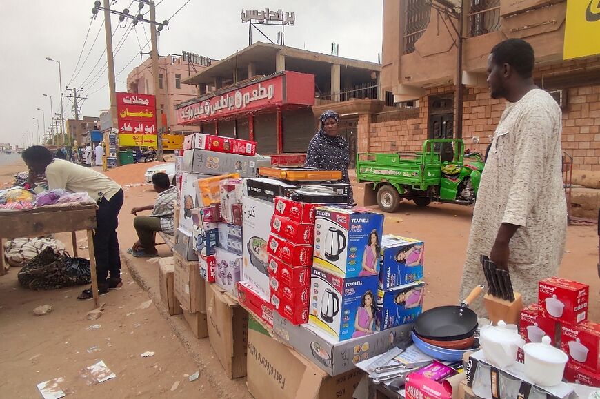 A street vendor touts for business in Omdurman