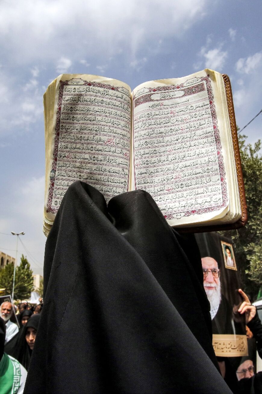 Protesters in Tehran and other Iranian cities heeded a call from authorities for nationwide demonstrations after Friday prayers