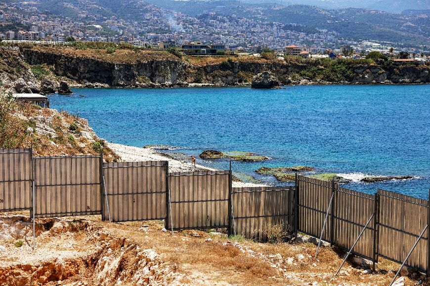 An area of coast fenced for development near a sea cave off the north Lebanon village of Amchit