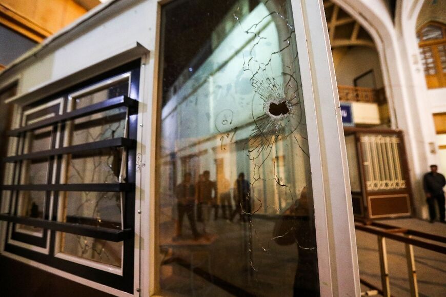 The fatal attack at Iran's Shah Cheragh mausoleum in Shiraz, the capital of Fars province, left windows shattered by bullets