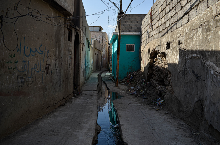 Open-air sewage runs through much of the old city of Mosul. Poor sanitation is one of the factors driving Iraqi doctors to overprescribe antibiotics to their patients. (Lyse Mauvais) 