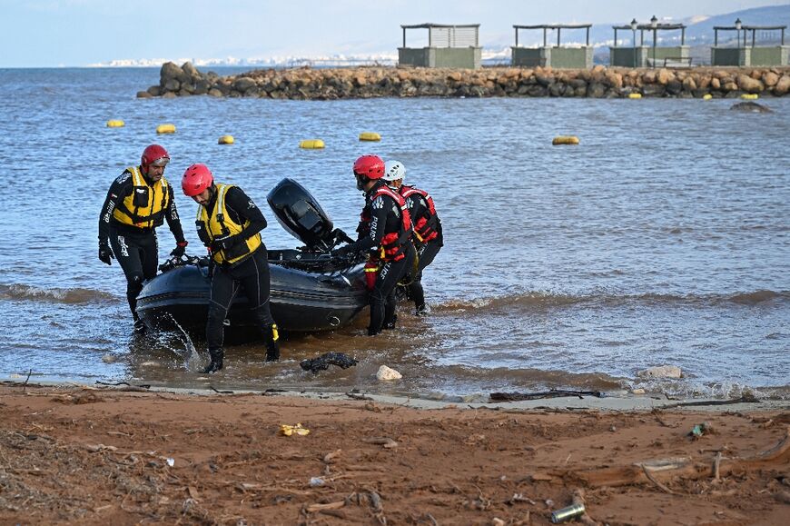 An Emirati rescue team assists in relief work in Libya's eastern city of Derna following deadly flash floods