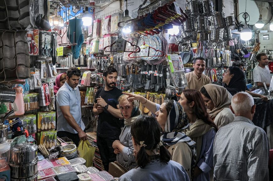 Iran is reeling under US sanctions, with the local currency losing 66 percent of its value since last year