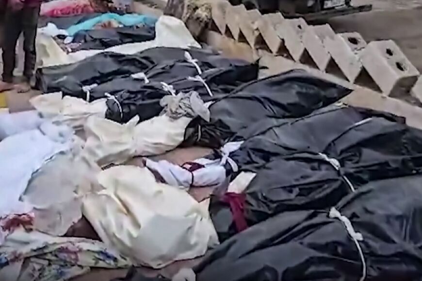 The wrapped bodies of victims of the floods