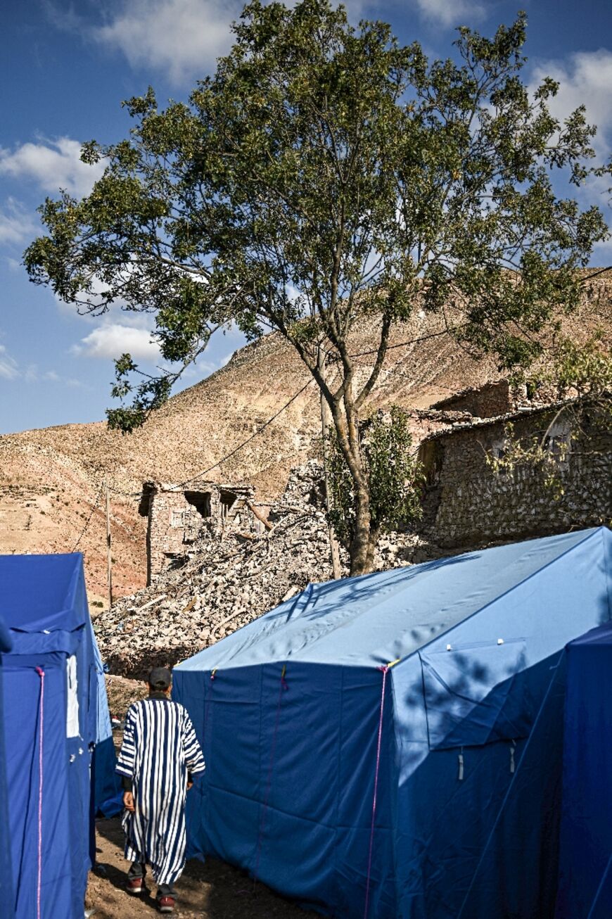 Villagers say the makeshift camp they have set up alongside their quake-ravaged homes provides sufficient shelter for now but worry about the approach of winter