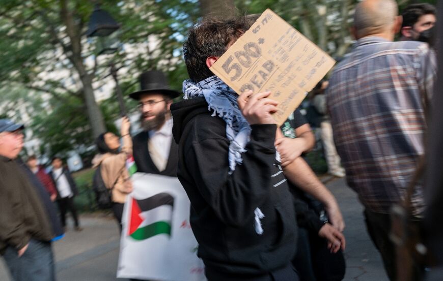 Supporters of both Palestine and Israel face off in dueling protests at Washington Square Park on October 17, 2023 in New York City