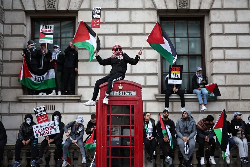 Many demonstrators in London carried Palestinian flags