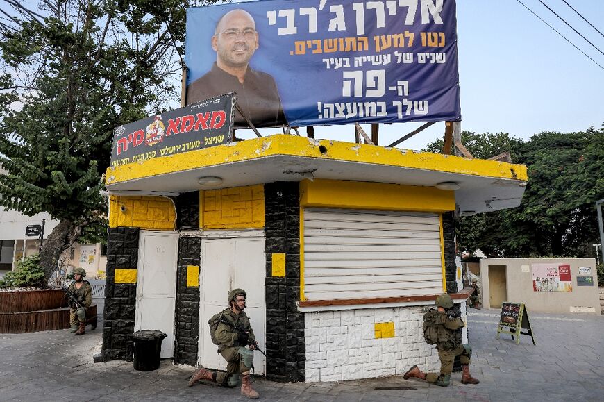 Israeli soldiers in the southern city of Sderot, just outside the Gaza Strip