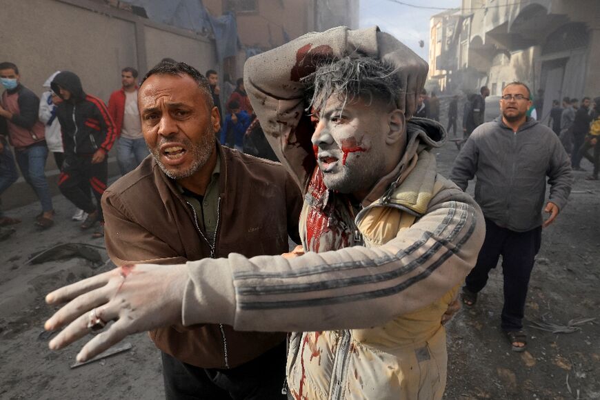 An Palestinian man is wounded after in a strike on Rafah in the southern Gaza Strip on November 20, 2023