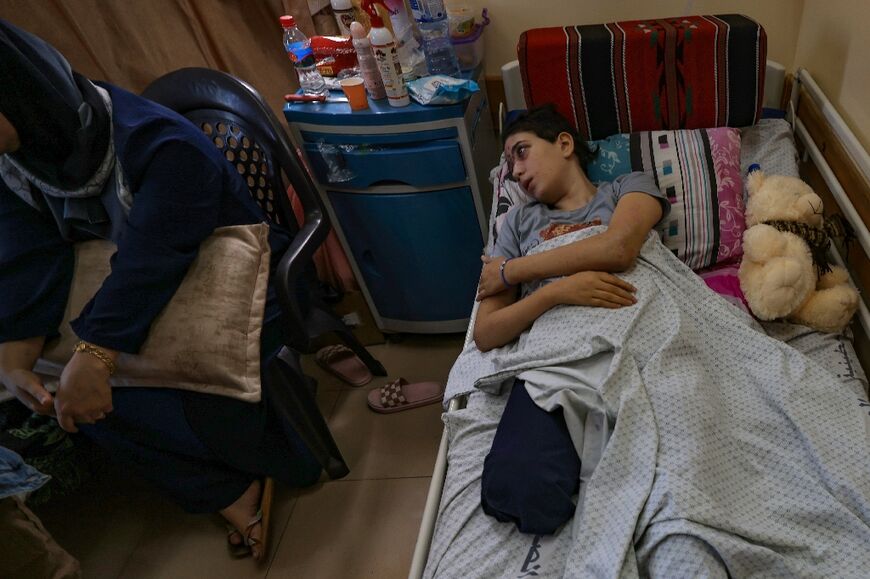 Lama al-Agha, 14, is another amputee at the Nasser hospital in Khan Yunis where her sister Sarah, 15, is treated in an adjacent bed