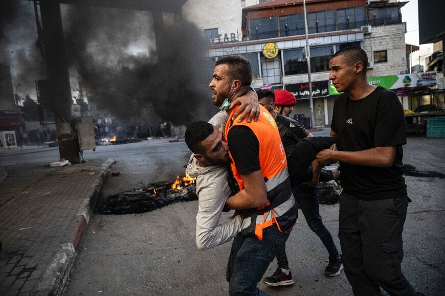 The Palestinian health ministry said 14 were killed in the raid, with the violence continuing until Thursday evening