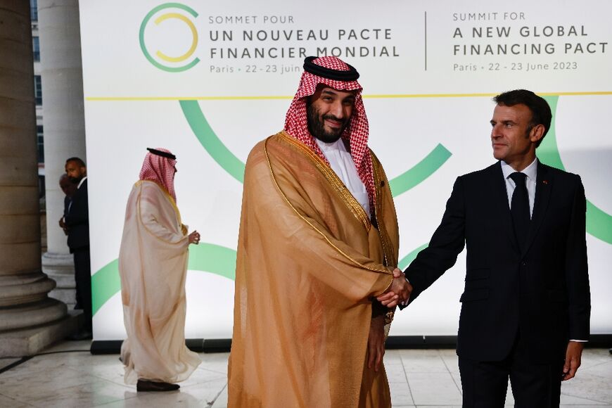 French President Emmanuel Macron (R) has assured Saudi of support from Paris