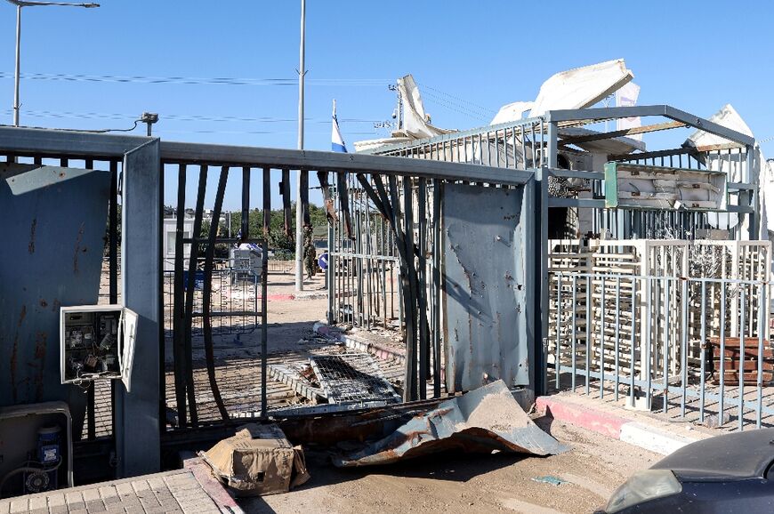 This picture taken during a media tour organised by the Israeli military shows damage to the Erez border crossing between southern Israel and the Gaza Strip after the attack by Hamas on October 7, 2023