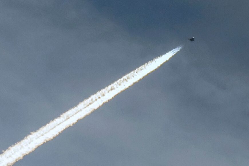 An Israeli air force fighter jet flies over the border area with south Lebanon in northern Israel 