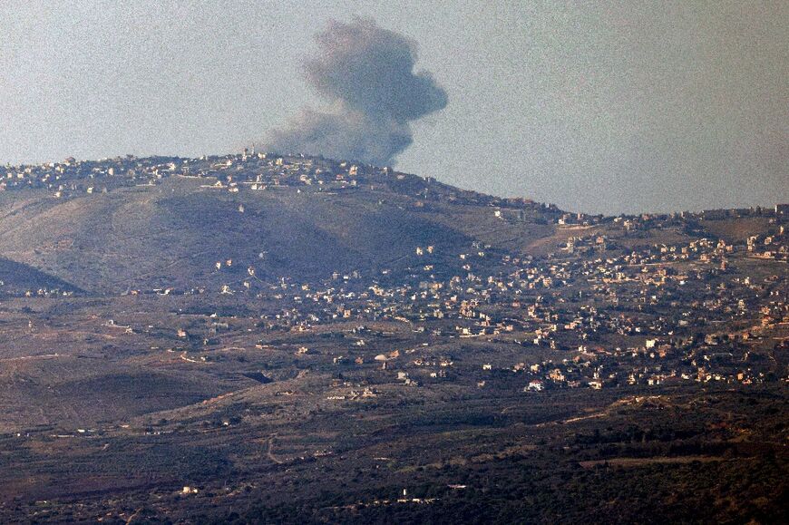 Smoke billows along hills in southern Lebanon after Israeli bombardment from a position along the border in northern Israel
