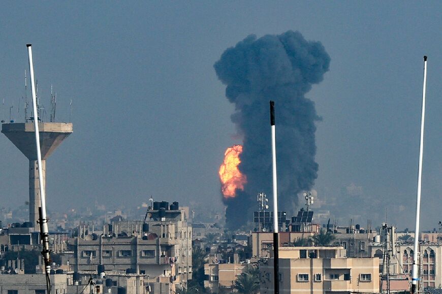 Smoke rises above buildings during an Israeli strike on Rafah in the southern Gaza Strip