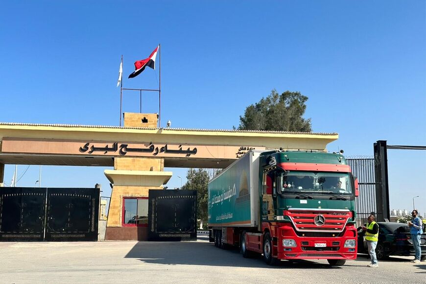 A truck returns after unloading humanitarian aid at Egypt's Rafah border crossing with the Gaza Strip on December 4, 2023 -- only a trickle of aid has entered Gaza since a truce broke down