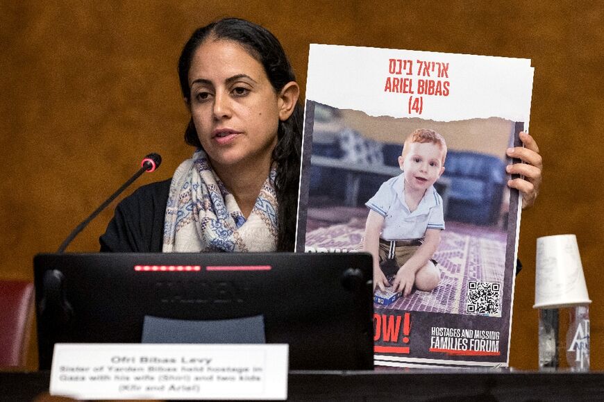 Ofri Bibas Levy, aunt of two Israeli children held with their parents by Hamas, speaks during a press conference