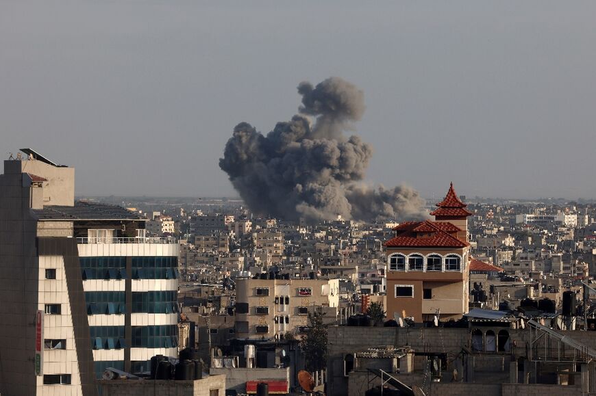 Smoke billows over Khan Yunis in the southern Gaza Strip during Israeli bombardments 