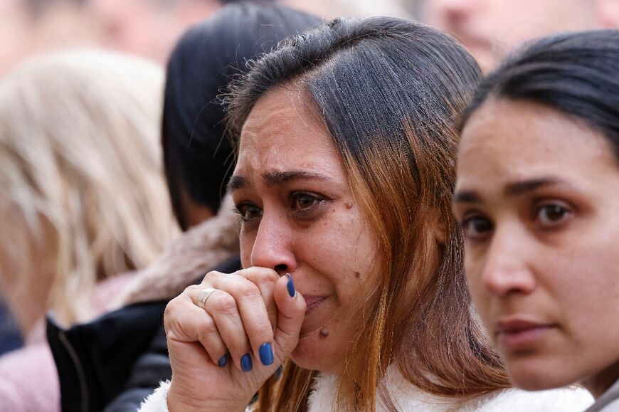 Israelis mourn during the funeral of Barak Ayalon and his mother Mira Ayalon, killed after a missile fired from Lebanon hit a house in the northern Israeli border community of Kfar Yuval 
