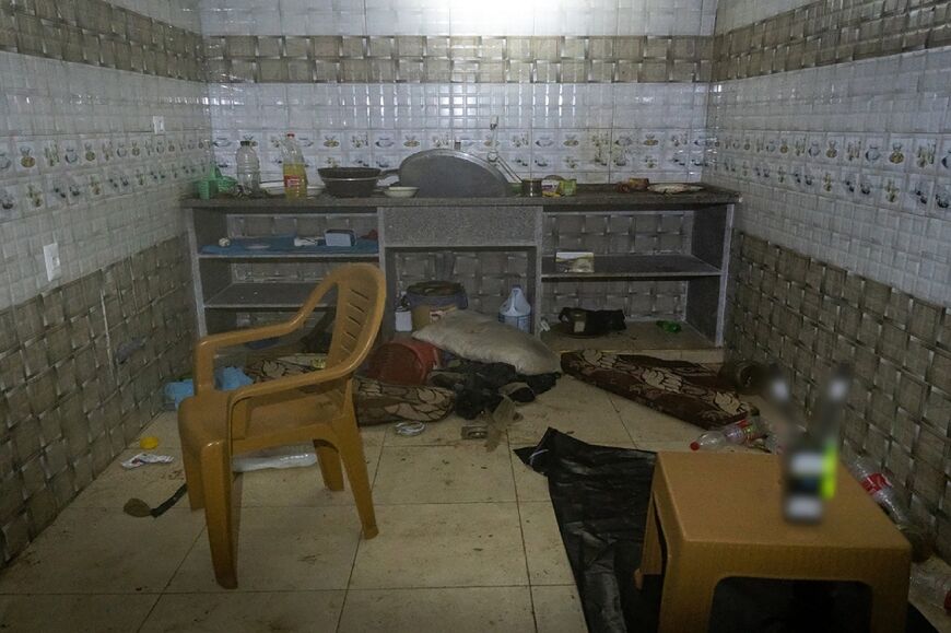 A picture released by the Israeli army shows a room it said troops discovered during a raid in an underground tunnel in Khan Yunis, the southern Gaza Strip -- some hostages had previously been kept in the tunnel, the army said
