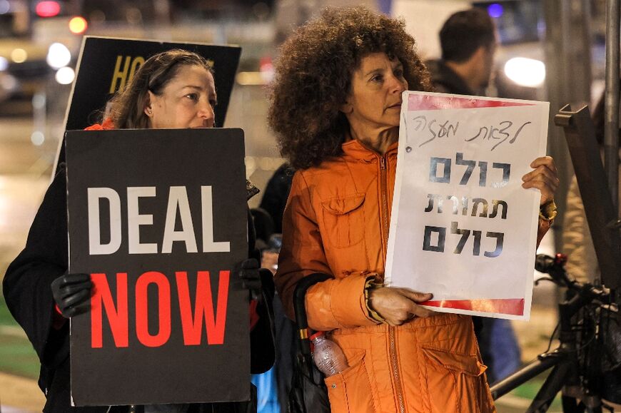 Families of Israeli hostages held in the Gaza Strip gather with supporters for a demonstration demanding an immediate deal, in Tel Aviv on January 29, 2024