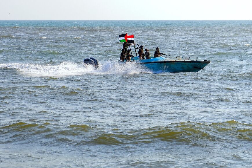 Members of the Yemeni Coast Guard affiliated with the Huthi rebel group patrol off the Red Sea port of Hodeida in solidarity with Gazans, on January 4, 2024