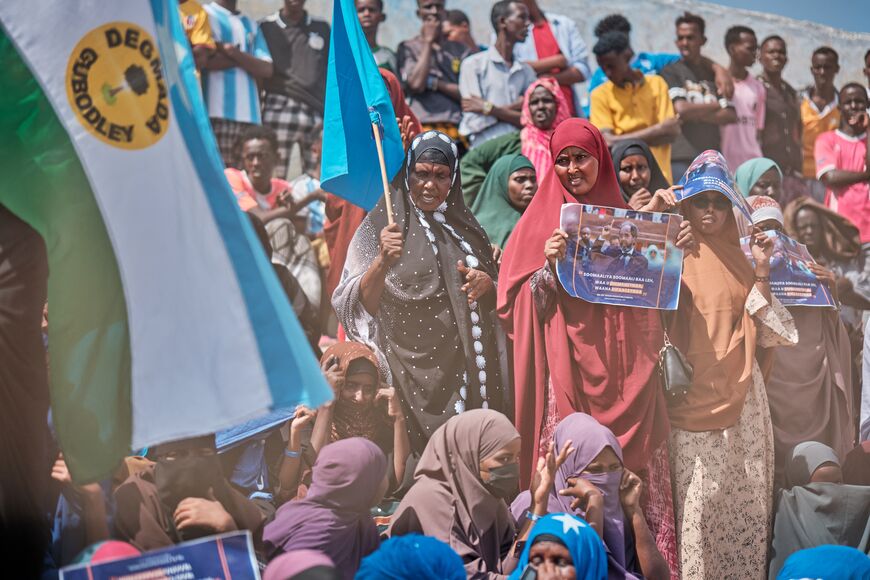 Demonstrators holds flags and banners during a demonstration in support of Somalia's government following the port deal signed between Ethiopia and the breakaway region of Somaliland at Eng Yariisow Stadium in Mogadishu on January 3, 2024. Somalia vowed to defend its territory after a controversial Red Sea access deal between Ethiopia and the breakaway state of Somaliland that it branded as "aggression". (Photo by ABDISHUKRI HAYBE / AFP) (Photo by ABDISHUKRI HAYBE/AFP via Getty Images)