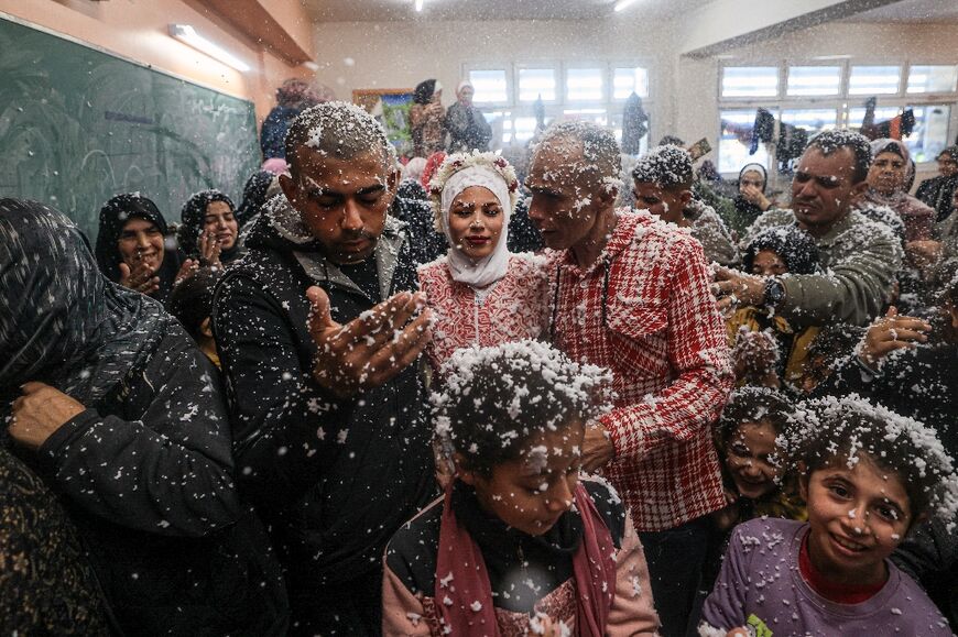 The raging war didn't stop Gaza couple Afnan Jibril and Mustafa Shamlakh from getting married in Rafah