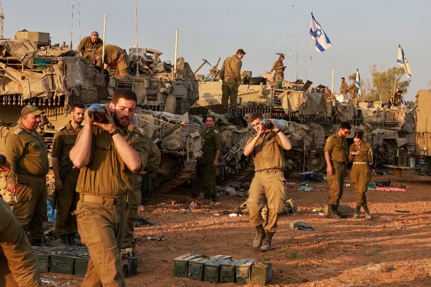Israeli soldiers at a position along the border with the Gaza Strip