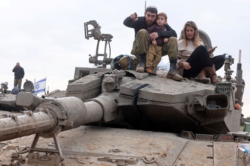 An Israeli soldier's family visits after he returned from a mission in Gaza
