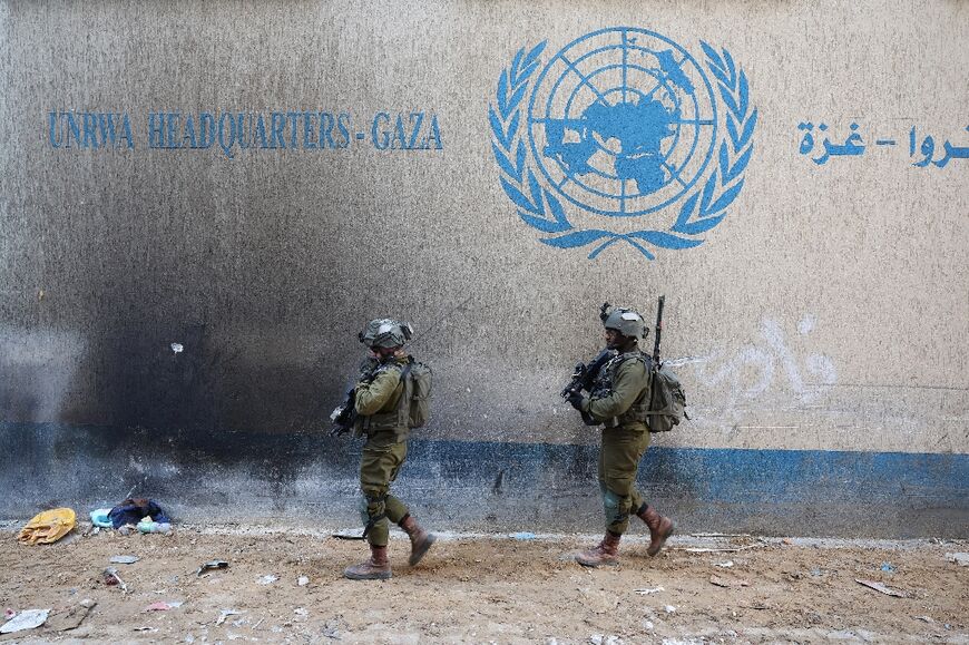 UNRWA says its staff were forced to leave its Gaza City headquarters compound under instruction from Israeli forces as bombardment intensified in the area