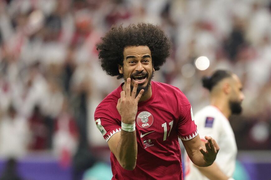 Akram Afif scored a hat-trick of penalties to give Qatar a second consecutive Asian Cup
